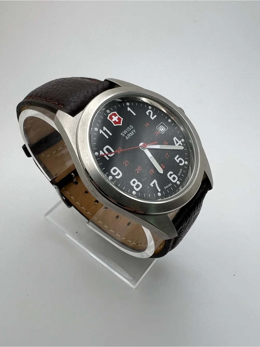 Victorinox Black Dial Watch with Brown Leather Strap and Red Accents